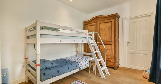 Bunk Beds in a Bedroom with a Wardrobe